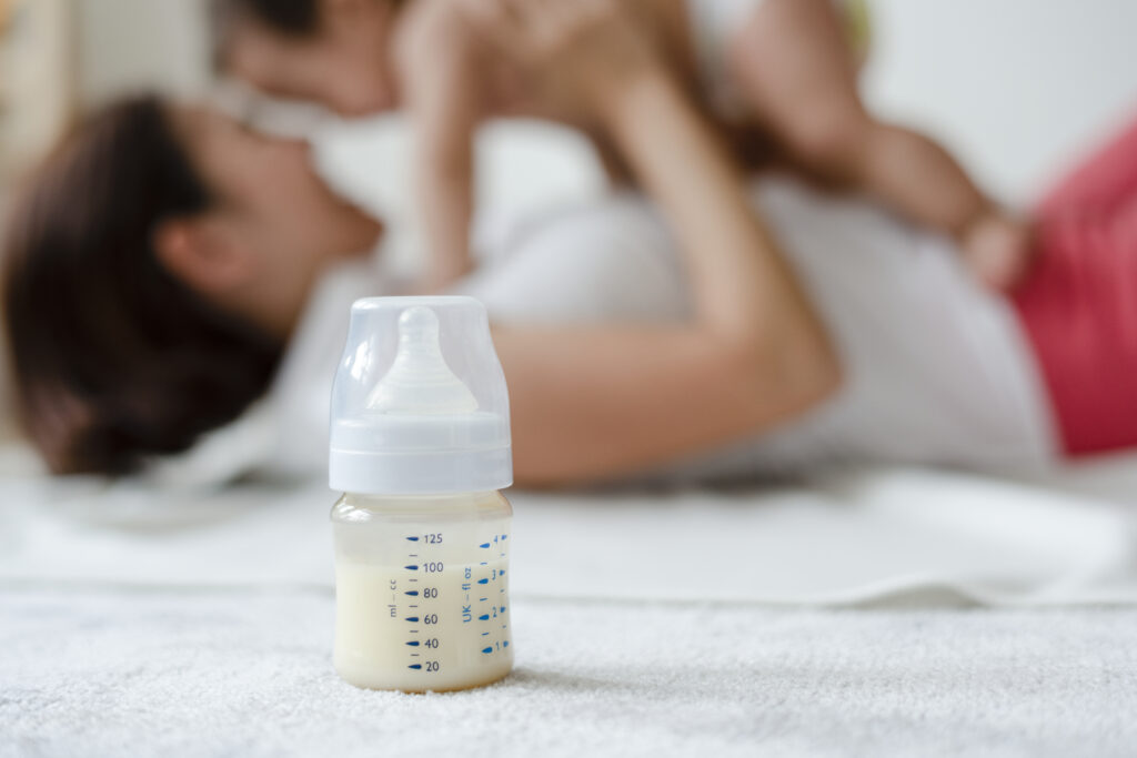 Breast milk or formula milk in the bottle- Motherhood and lactation 
